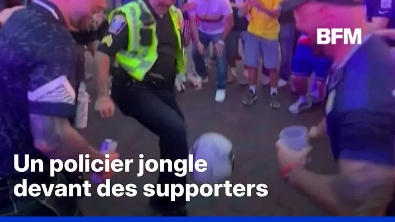 UN POLICIER AMÉRICAIN JONGLE DEVANT DES SUPPORTERS À BOSTON