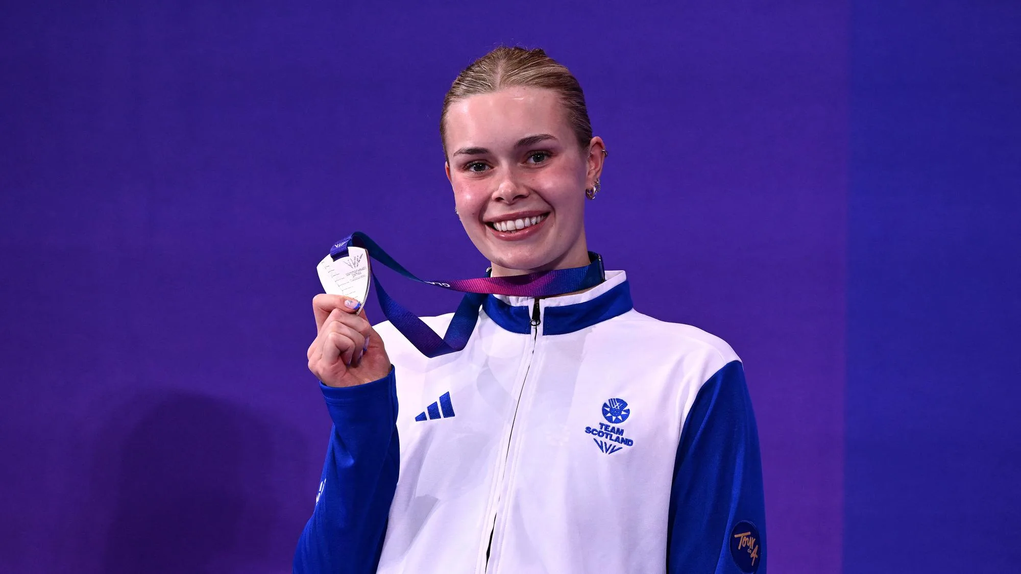 LA NAGEUSE BRITANNIQUE KATIE SHANAHAN REFUSE LOVE ISLAND POUR GAGNER UNE MÉDAILLE À LA PLACE